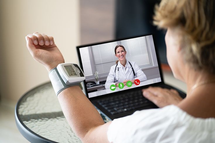 Telehealth Patient Making Hypertension Blood Medicine Test